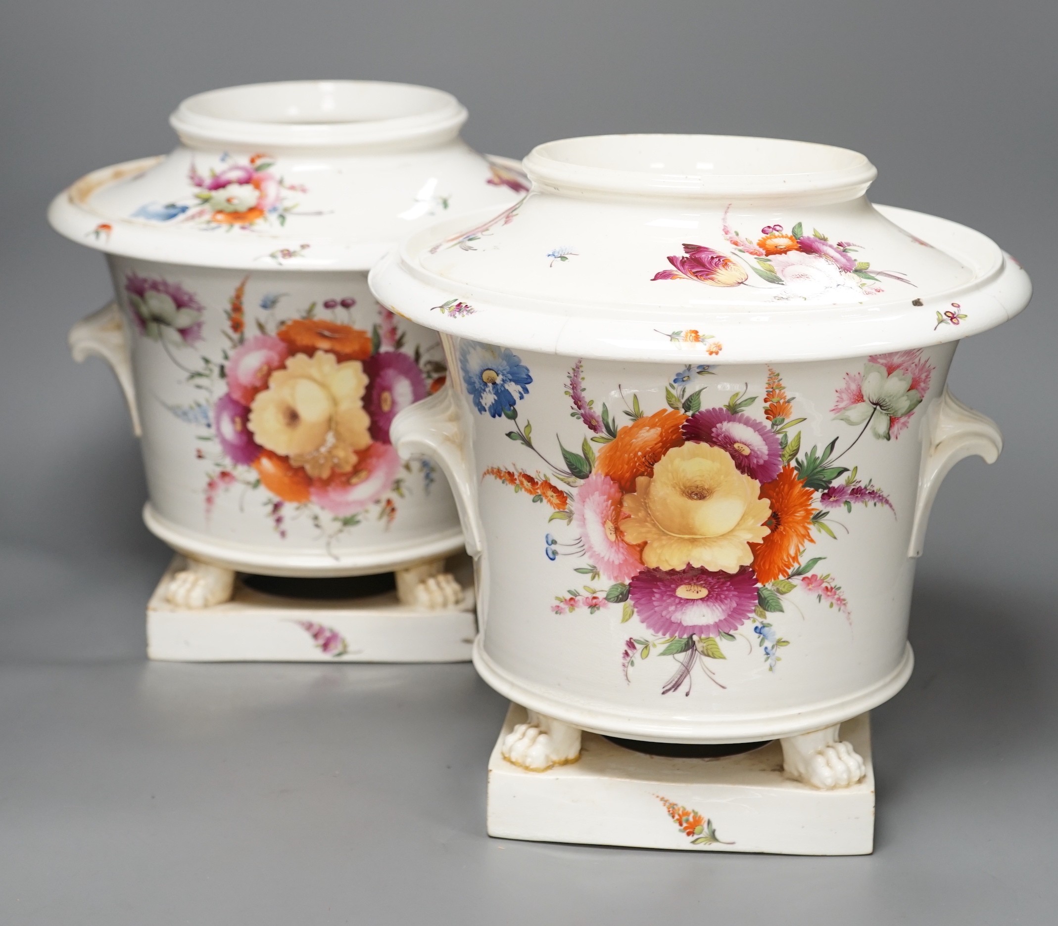 A pair of early 19th century Coalport floral painted ice pails, 29cm